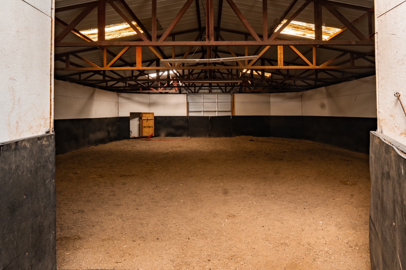 The 60-foot indoor round pen for groundwork and starting colts